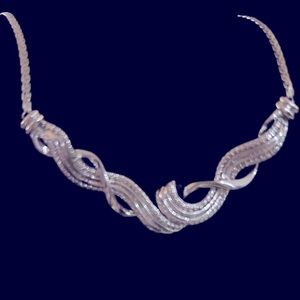 Necklace Diamonds ,925 Sterling Silver Woven Ribbon Pendant on 18” chain.